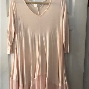 Large peach blouse